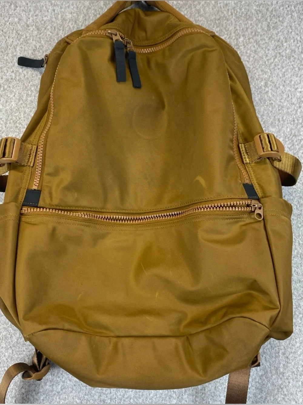 Lululemon Crew Backpack 22L Trail Bronze Logo Missing Fair Condition  Spots